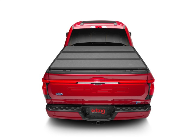 Load image into Gallery viewer, Extang 21-23 Ford F-150 (5ft. 7in. Bed) Solid Fold ALX
