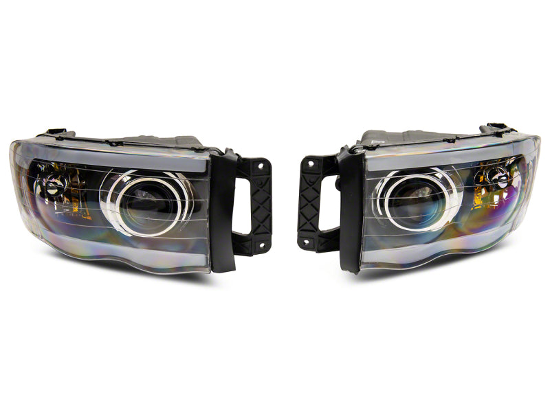 Load image into Gallery viewer, Raxiom 02-05 Dodge RAM 1500 LED Projector Headlights w/ SEQL LED Bar- Blk Housing (Clear Lens)
