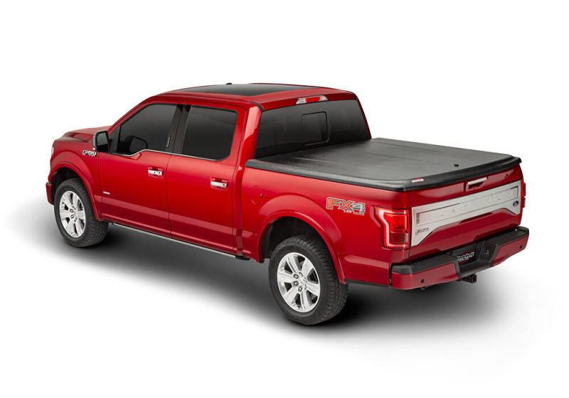 Load image into Gallery viewer, UnderCover 07-13 Toyota Tundra 6.5ft SE Bed Cover - Black Textured
