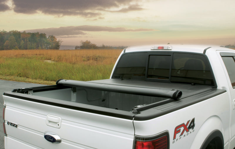 Load image into Gallery viewer, Lund 02-17 Dodge Ram 1500 (8ft. BedExcl. Beds w/Rambox) Genesis Roll Up Tonneau Cover - Black
