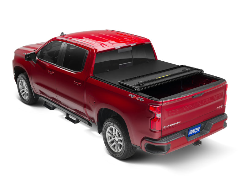 Load image into Gallery viewer, Tonno Pro 19-23 GM/Chevy Sierra / Silverado 8ft. 2in. Bed Hard Fold Tonneau Cover
