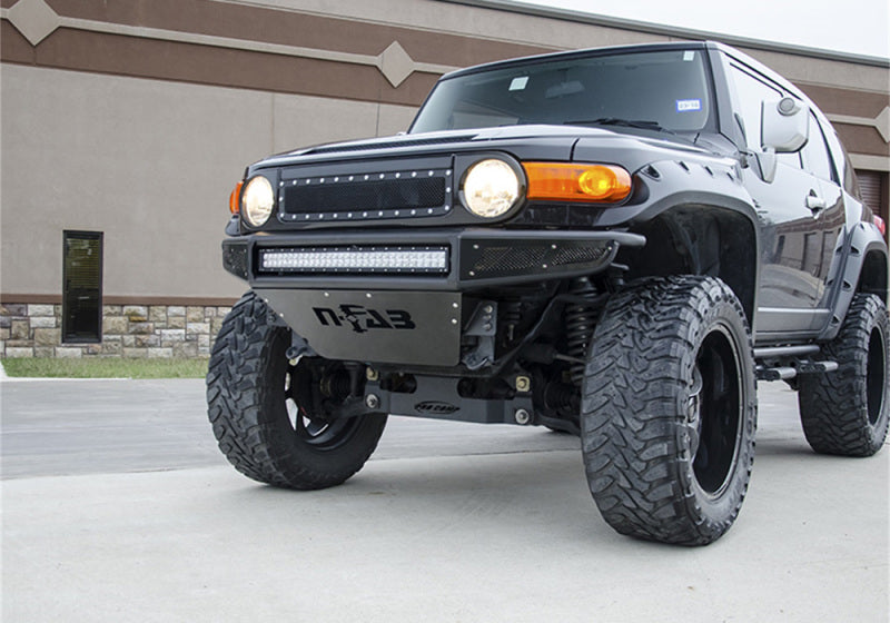 Load image into Gallery viewer, N-Fab M-RDS Front Bumper 06-17 Toyota FJ Cruiser - Tex. Black w/Silver Skid Plate
