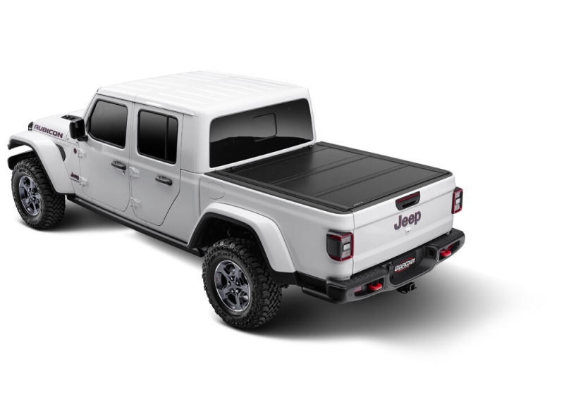 Load image into Gallery viewer, UnderCover 2020 Jeep Gladiator 5ft Ultra Flex Bed Cover - Matte Black Finish
