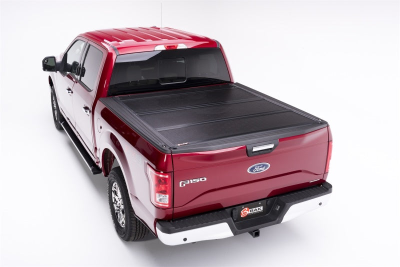 Load image into Gallery viewer, BAK 21-22 Ford F-150 (Incl. 2022 Lightning) BAKFlip F1 5.7ft Bed Cover
