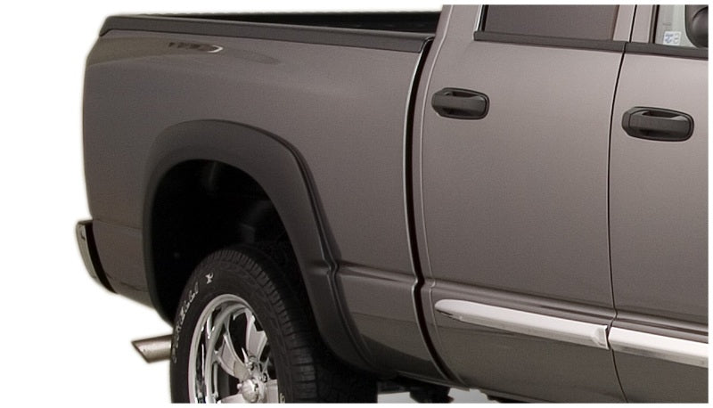 Load image into Gallery viewer, Bushwacker 02-05 Dodge Ram 1500 Fleetside OE Style Flares 4pc 75.9/76.3/97.9in Bed - Black
