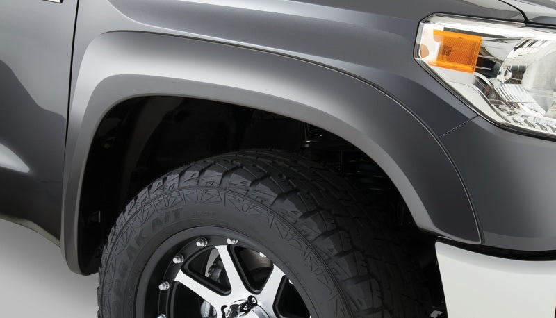 Load image into Gallery viewer, Bushwacker 14-18 Toyota Tundra Fleetside Extend-A-Fender Style Flares 4pc - Black
