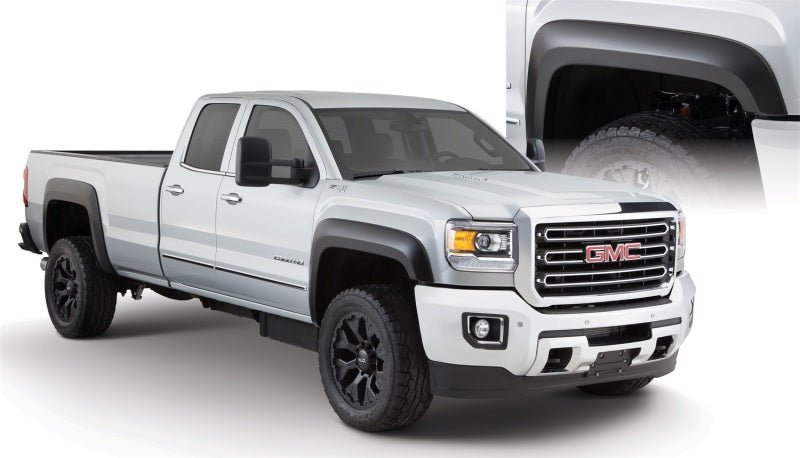 Load image into Gallery viewer, Bushwacker 15-18 GMC Sierra 2500 HD Extend-A-Fender Style Flares 4pc 78.8/97.6in Bed - Black
