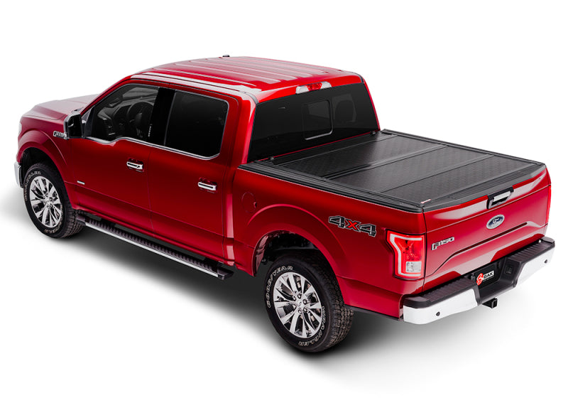 Load image into Gallery viewer, BAK 08-16 Ford Super Duty 8ft Bed BAKFlip G2
