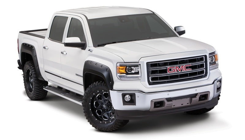 Load image into Gallery viewer, Bushwacker 14-15 GMC Sierra 1500 Pocket Style Flares 4pc - Black
