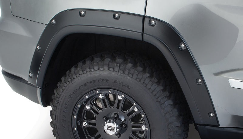 Load image into Gallery viewer, Bushwacker 11-18 Jeep Grand Cherokee Pocket Style Flares 2pc Does Not Fit SRT8 - Black
