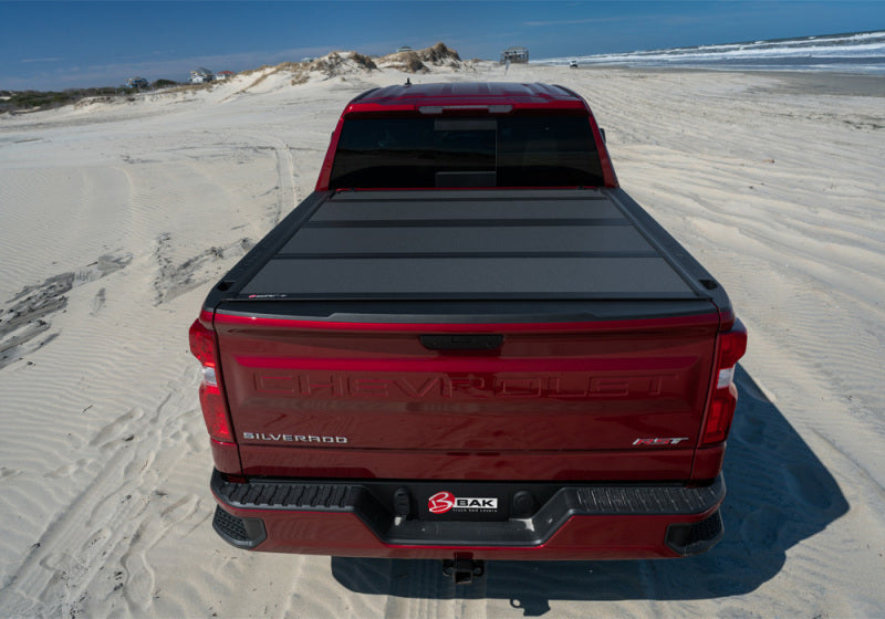 Load image into Gallery viewer, BAK 04-15 Nissan Titan 5ft 6in Bed BAKFlip MX4 Matte Finish
