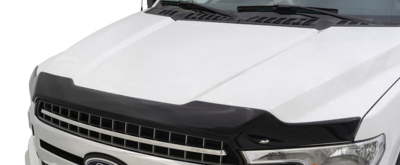 Load image into Gallery viewer, AVS 10-14 Ford F-150 SVT Raptor Aeroskin Low Profile Acrylic Hood Shield - Smoke
