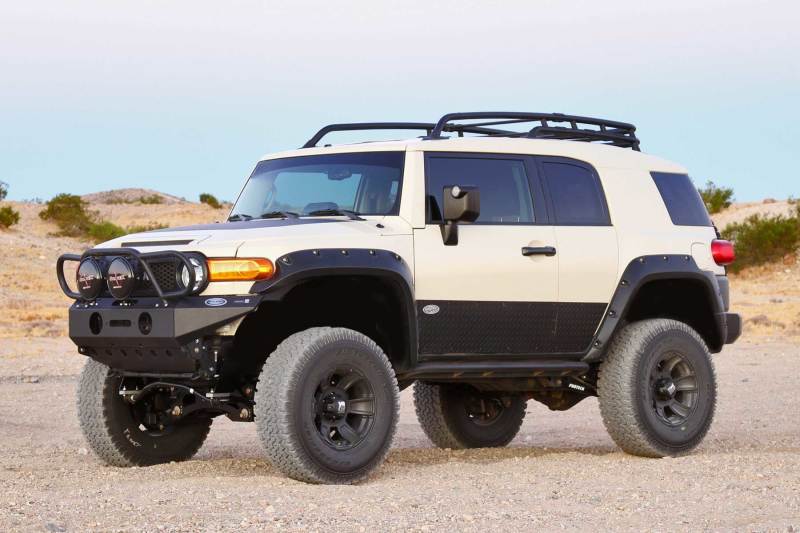 Load image into Gallery viewer, Fabtech 10-13 Toyota FJ 4WD 6in Basic Sys w/Perf Shks

