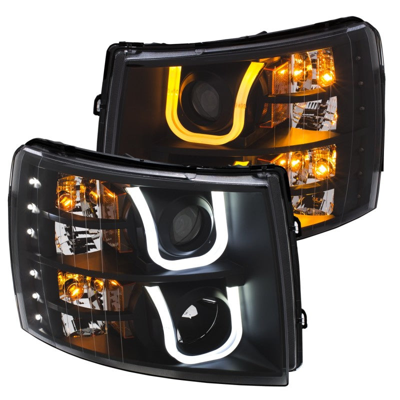 Load image into Gallery viewer, ANZO 2007-2013 Chevrolet Silverado 1500/2500 Projector Headlights w/ U-Bar Switchback Black w/ Amber
