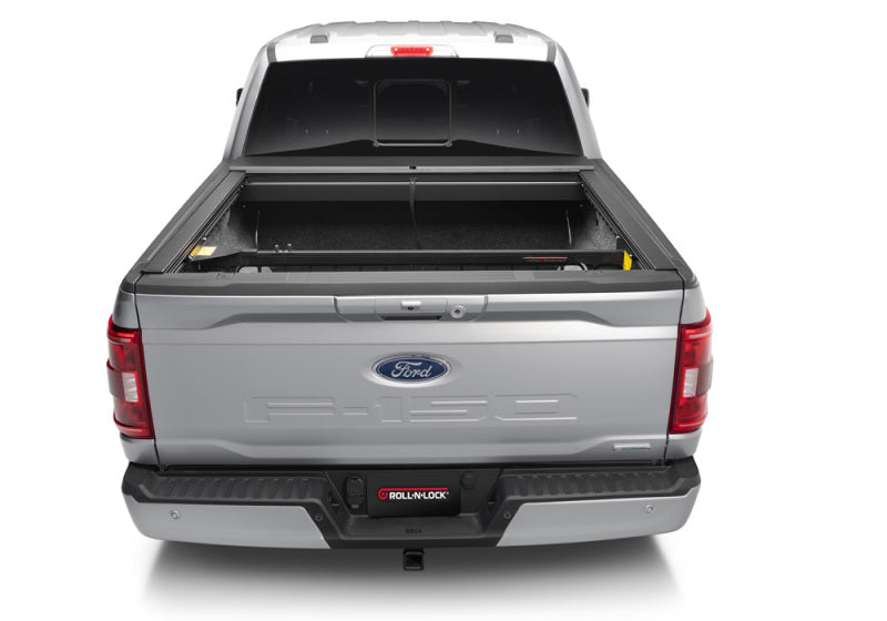 Load image into Gallery viewer, Roll-N-Lock 15-18 Ford F-150 SB 77-3/8in Cargo Manager
