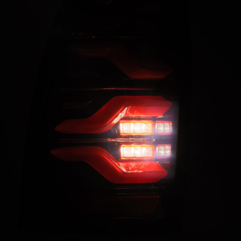 Load image into Gallery viewer, AlphaRex 05-15 Toyota Tacoma LUXX LED Taillights Blk/Red w/Activ Light/Seq Signal
