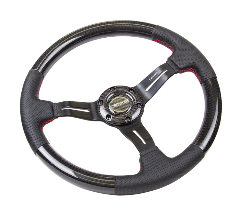 Load image into Gallery viewer, NRG Carbon Fiber Steering Wheel (350mm /1.5in. Deep) Leather Trim w/Red Stitch &amp; Slit Cutout Spokes
