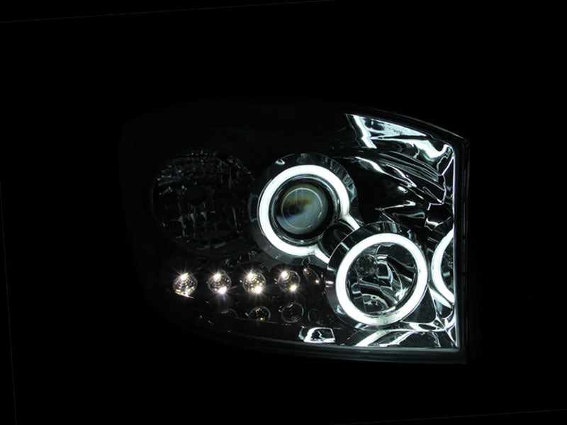 Load image into Gallery viewer, ANZO 2006-2008 Dodge Ram 1500 Projector Headlights w/ Halo Chrome (CCFL)
