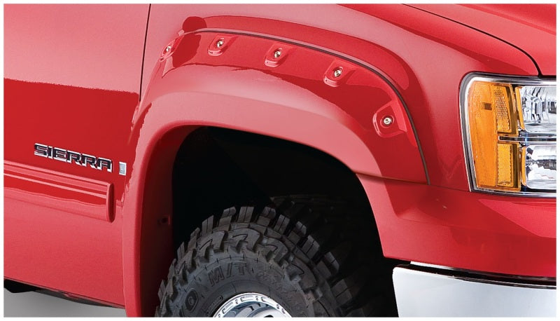 Load image into Gallery viewer, Bushwacker 07-13 GMC Sierra 1500 Fleetside Cutout Style Flares 4pc 69.3in Bed - Black
