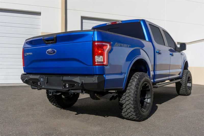 Load image into Gallery viewer, Addictive Desert Designs 15-18 Ford F-150 Stealth Fighter Rear Bumper w/ Backup Sensor Cutout
