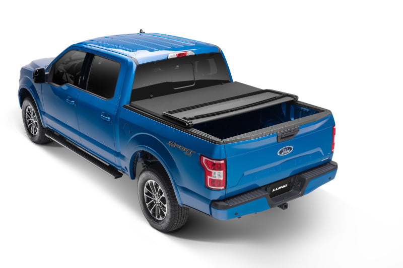 Load image into Gallery viewer, Lund 07-17 Toyota Tundra (5.5ft. Bed) Genesis Elite Tri-Fold Tonneau Cover - Black
