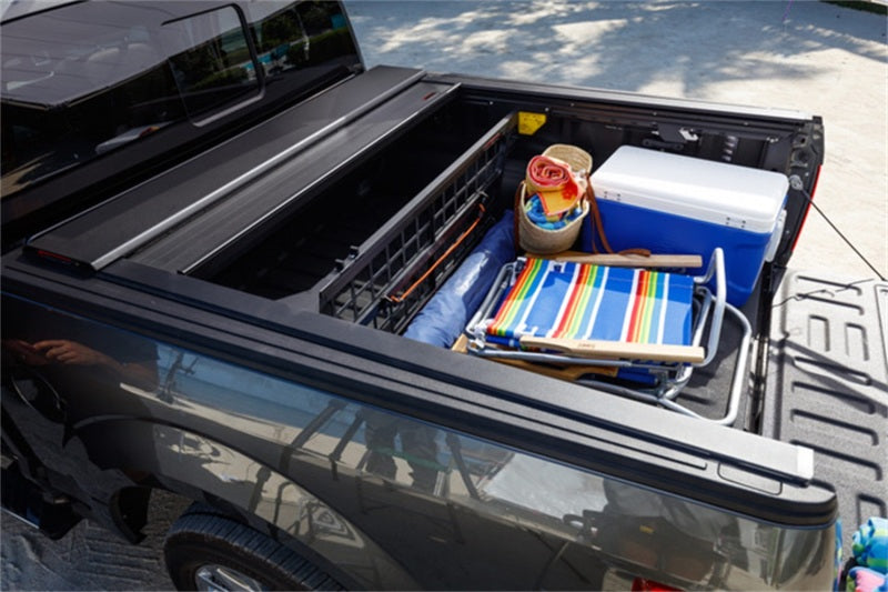 Load image into Gallery viewer, Roll-N-Lock 07-17 Toyota Tundra Crew Max Cab 65in E-Series Retractable Tonneau Cover
