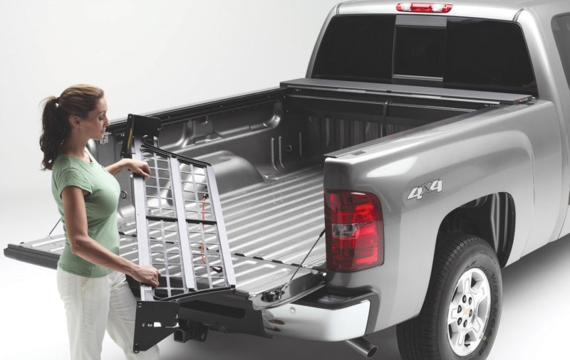 Load image into Gallery viewer, Roll-N-Lock 08-16 Ford F-250/F-350 Super Duty SB 80-1/4in Cargo Manager
