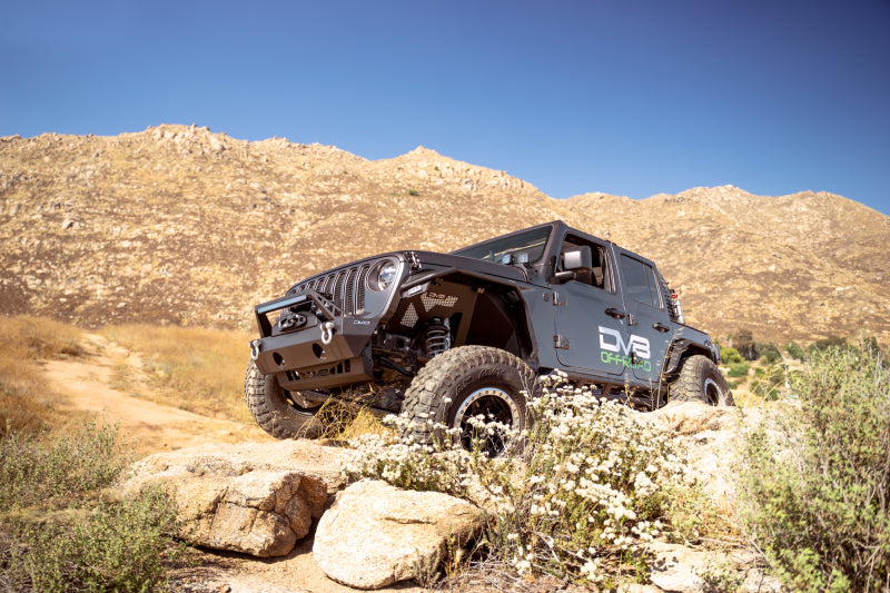 Load image into Gallery viewer, DV8 Offroad 07-23 Jeep Wrangler/Gladiator JT/JK/JL FS-25 Stubby Front Bumper w/Plated Bull Bar
