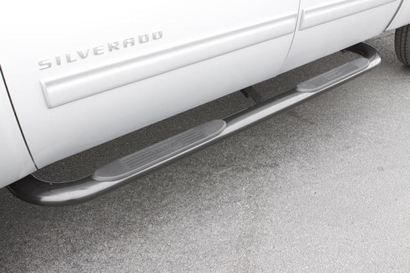 Load image into Gallery viewer, Lund 2019 Chevy Silverado 1500 Crew Cab 4in. Oval Curved Steel Nerf Bars - Black
