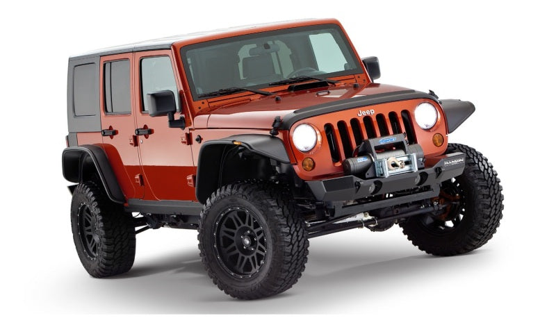 Load image into Gallery viewer, Bushwacker 07-18 Jeep Wrangler Unlimited Flat Style Flares 4pc 4-Door Sport Utility Only - Black
