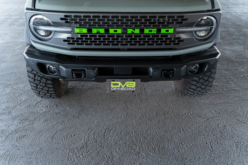 Load image into Gallery viewer, DV8 Offroad 21-23 Ford Bronco Capable Bumper Front License Plate Mount
