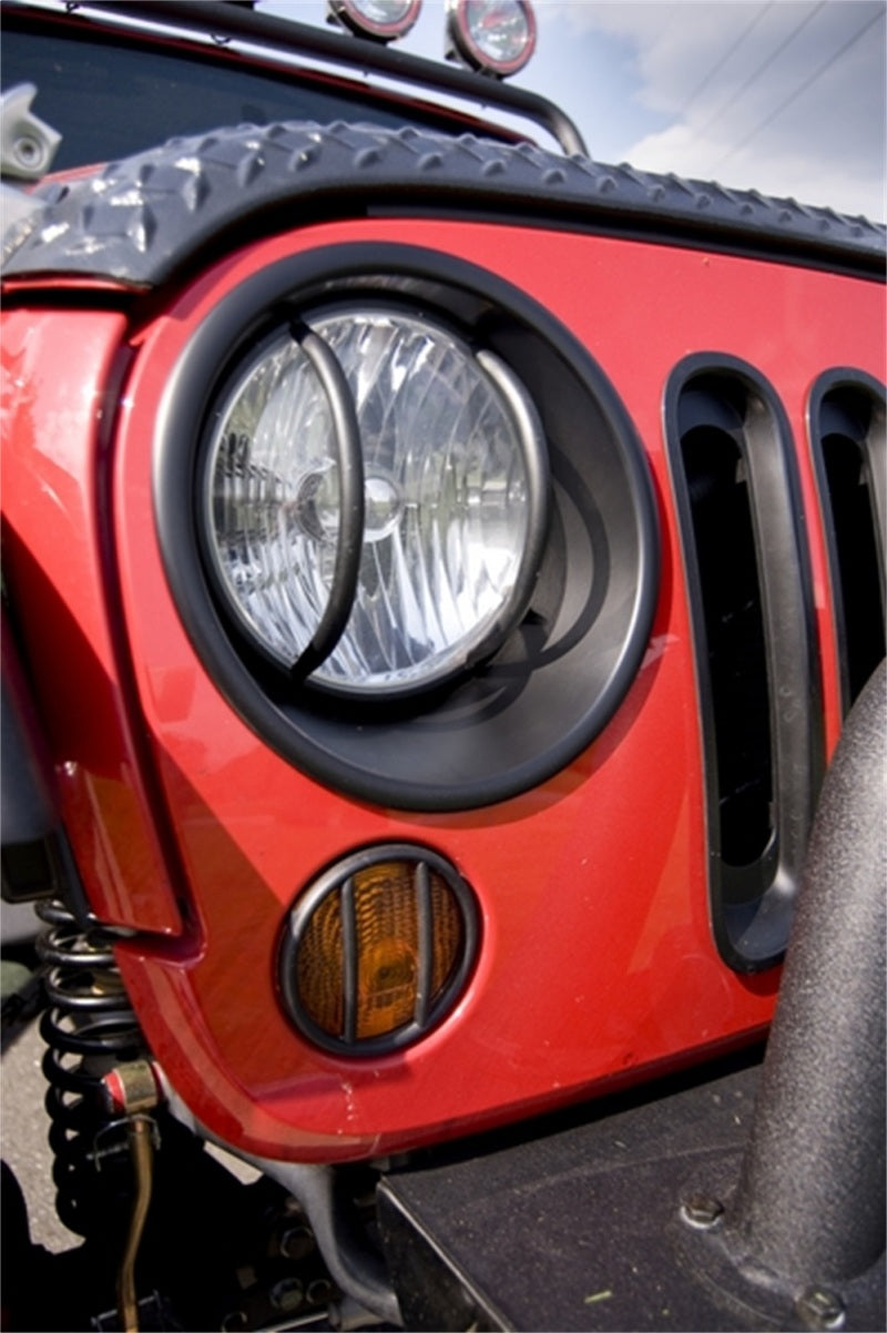 Load image into Gallery viewer, Rugged Ridge Headlight Bezels Black 07-18 Jeep Wrangler JK
