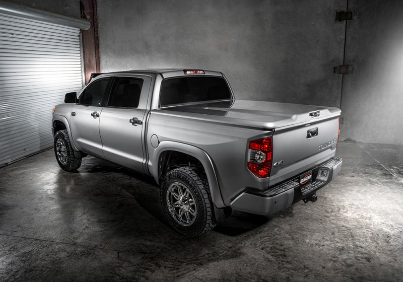 Load image into Gallery viewer, UnderCover 16-20 Toyota Tacoma 5ft Elite LX Bed Cover - Bright Red (Req Factory Deck Rails)
