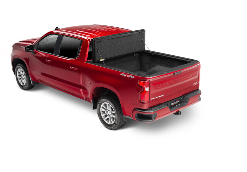 Load image into Gallery viewer, UnderCover 16-20 Nissan Navara 5ft Ultra Flex Bed Cover - Matte Black Finish
