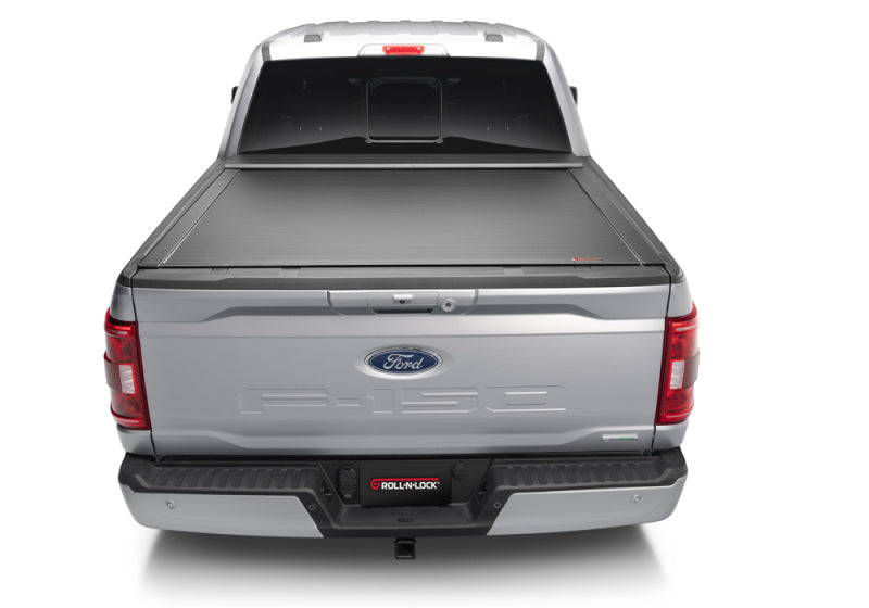 Load image into Gallery viewer, Roll-N-Lock 15-17 Ford F-150 77-3/8in E-Series Retractable Tonneau Cover
