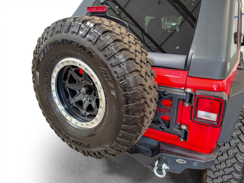 Load image into Gallery viewer, DV8 Offroad 2018+ Jeep Wrangler Tire Carrier

