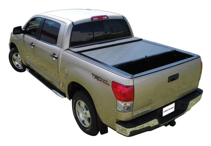 Load image into Gallery viewer, Roll-N-Lock 07-18 Toyota Tundra Crew Max Cab XSB 65in M-Series Retractable Tonneau Cover
