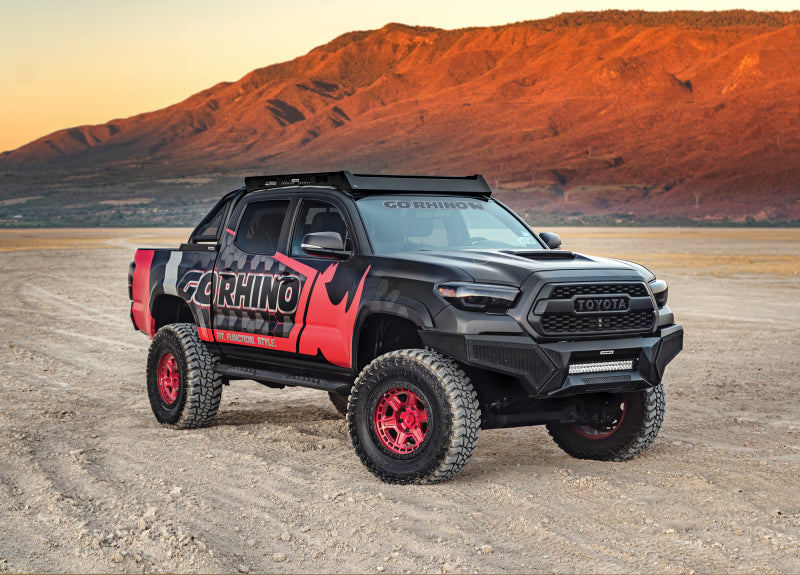 Load image into Gallery viewer, Go Rhino 16-21 Tacoma Element Front Bumper w/ Power Actuated Hide-away Light Bar Mount Tex Black
