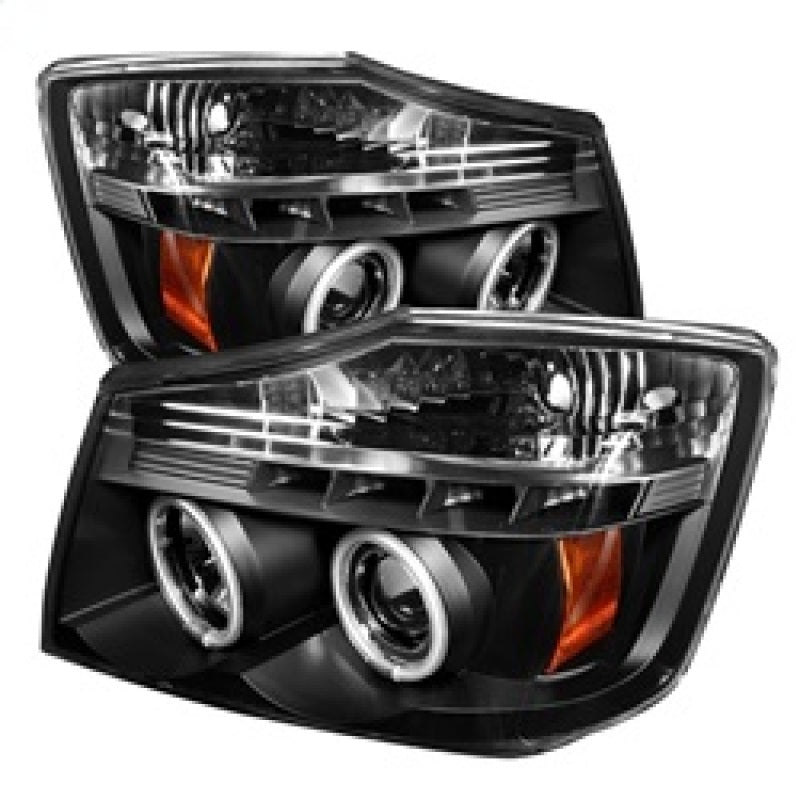 Load image into Gallery viewer, Spyder Nissan Titan 04-14/Armada 04-07 Projector Headlights CCFL Halo LED Blk PRO-YD-NTI04-CCFL-BK
