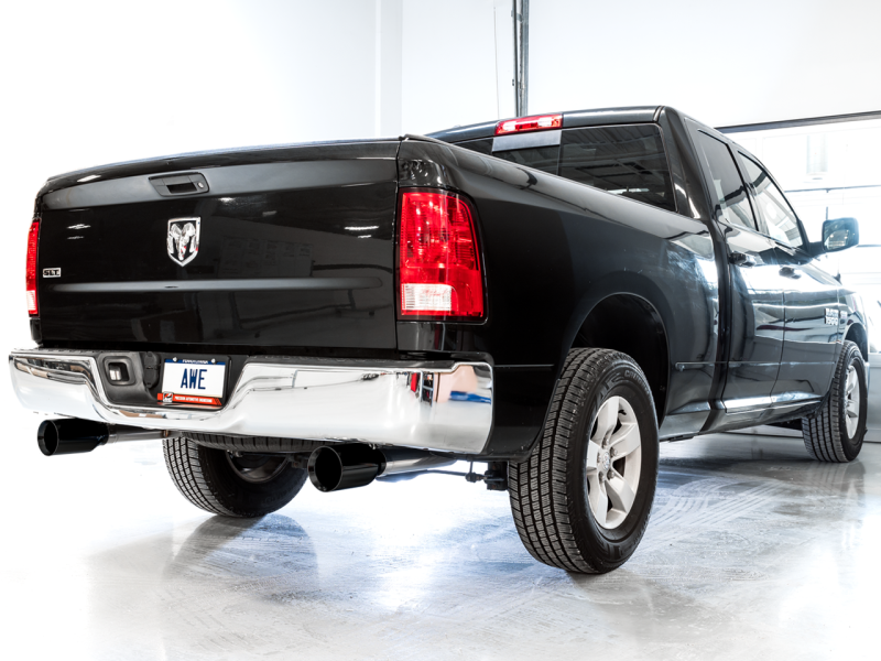 Load image into Gallery viewer, AWE Tuning 09-18 RAM 1500 5.7L (w/o Cutout) 0FG Dual Rear Exit Cat-Back Exhaust - Diamond Black Tips
