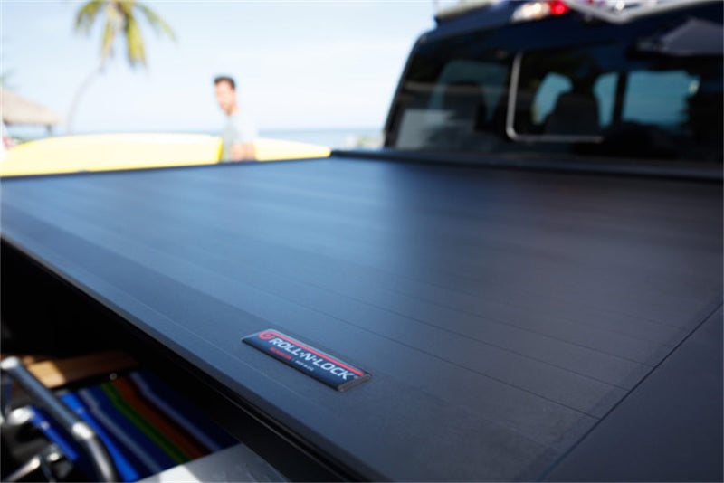 Load image into Gallery viewer, Roll-N-Lock 07-17 Toyota Tundra Crew Max Cab 65in E-Series Retractable Tonneau Cover
