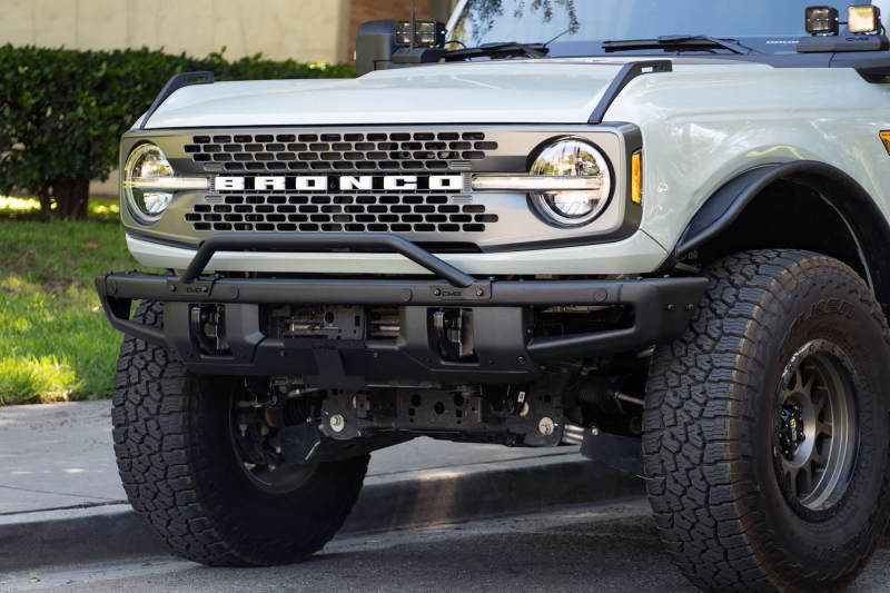 Load image into Gallery viewer, DV8 Offroad 21-22 Ford Bronco Factory Front Bumper Licence Relocation Bracket - Front
