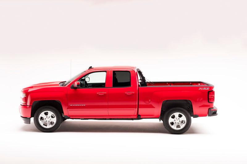 Load image into Gallery viewer, BAK 14-18 Chevy Silverado 1500 / 15-20 Silverado 2500/3500 5ft 8in Bed BAKFlip MX4 Matte Finish
