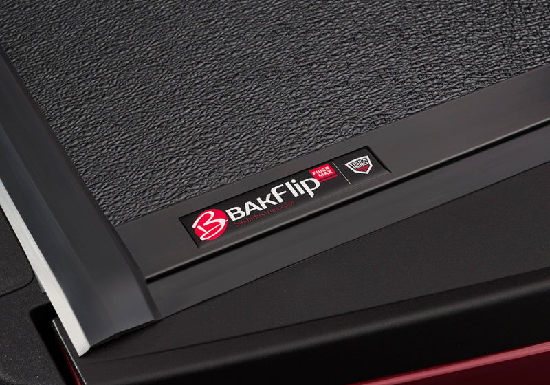 Load image into Gallery viewer, BAK 08-16 Ford Super Duty 6ft 9in Bed BAKFlip FiberMax
