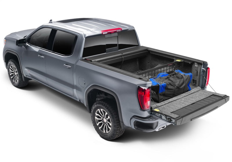 Load image into Gallery viewer, Roll-N-Lock 2020 Chevy Silverado/Sierra 2500/3500 MB 80-1/2in Cargo Manager
