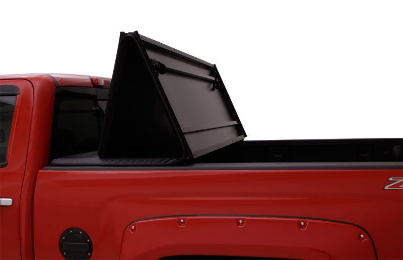 Load image into Gallery viewer, Lund 04-06 Chevy Silverado 1500 Fleetside (5.8ft. Bed) Hard Fold Tonneau Cover - Black
