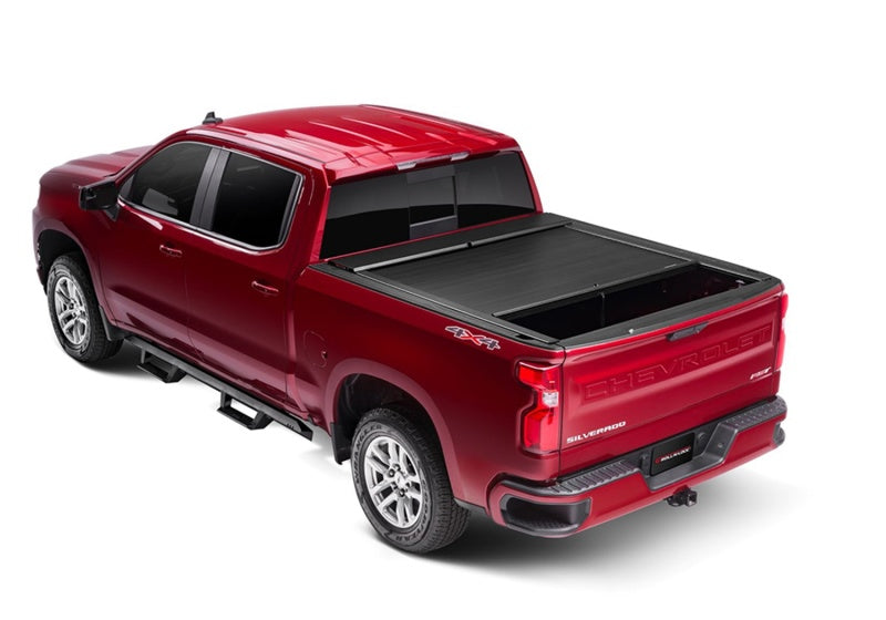 Load image into Gallery viewer, Roll-N-Lock 2020 GM Silverado / Sierra 2500/3500 6ft 10in Bed A-Series Retractable Tonneau Cover
