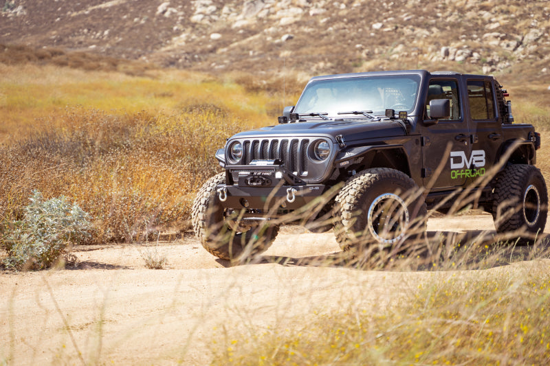 Load image into Gallery viewer, DV8 Offroad 07-23 Jeep Wrangler/Gladiator JT/JK/JL FS-25 Stubby Front Bumper w/Plated Bull Bar
