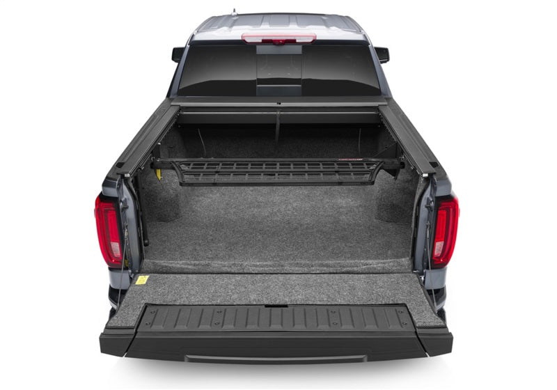 Load image into Gallery viewer, Roll-N-Lock 2020 Chevy Silverado/Sierra 2500/3500 MB 80-1/2in Cargo Manager
