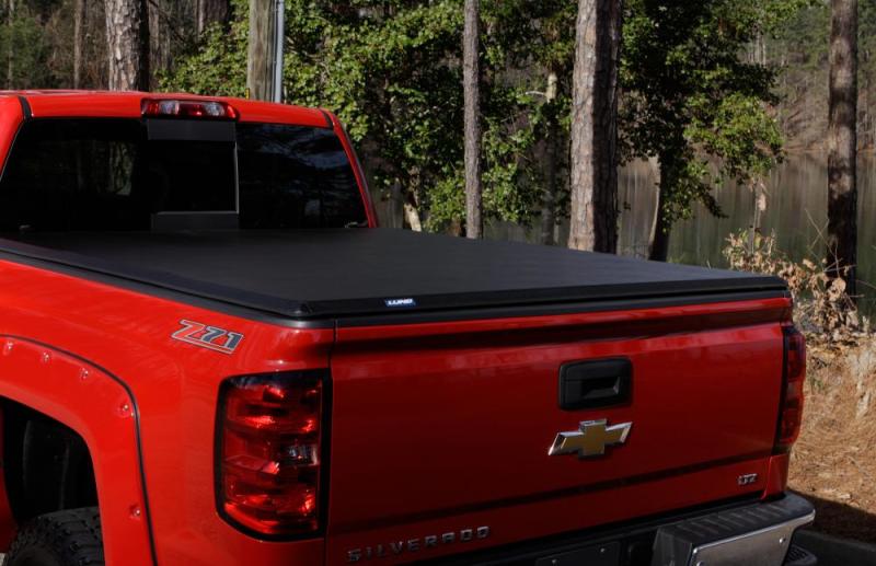 Load image into Gallery viewer, Lund 15-17 Chevy Colorado Fleetside (6ft. Bed) Hard Fold Tonneau Cover - Black
